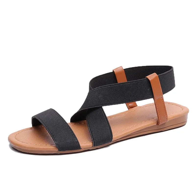 SANDALIAS PLANAS ROMANAS CON ELÁSTICO - AERELIS