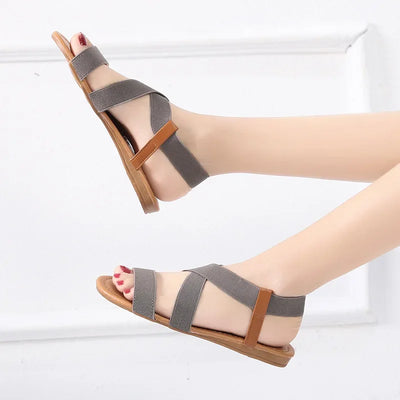 SANDALIAS PLANAS ROMANAS CON ELÁSTICO - AERELIS